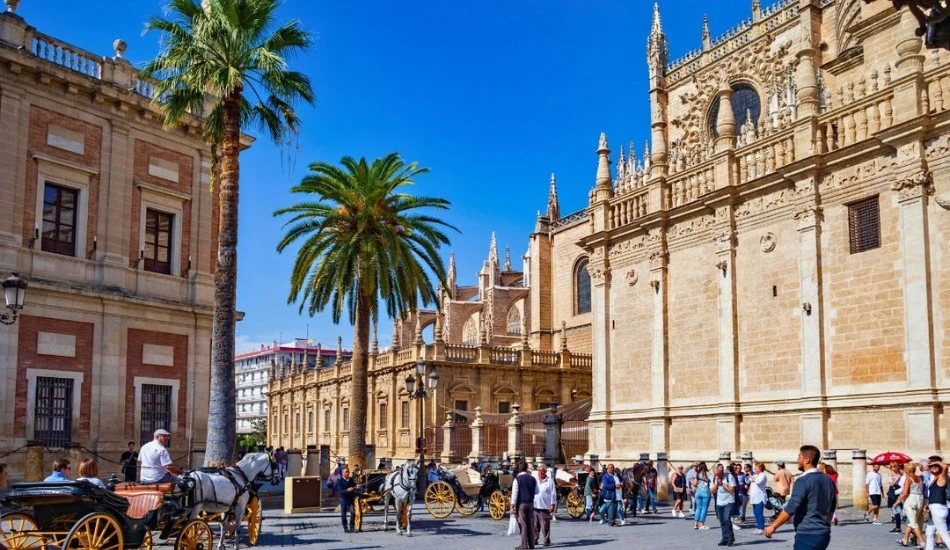 Buy Seville Cathedral online in advance Tourists visiting Seville Cathedral.