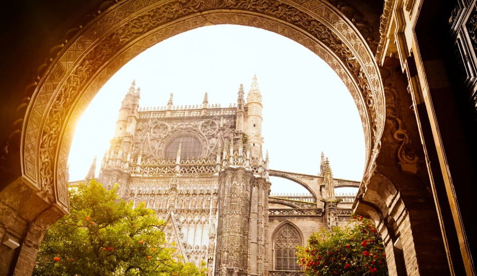A photograph of Seville Cathedral from an arc.